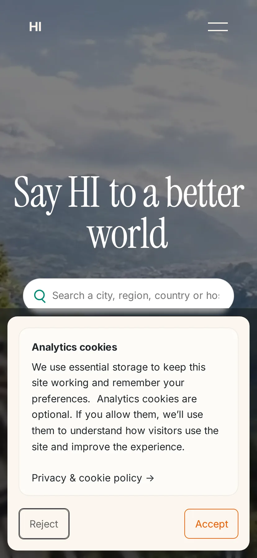 Hostelling International's landing page rendered on a 414px-wide mobile viewport