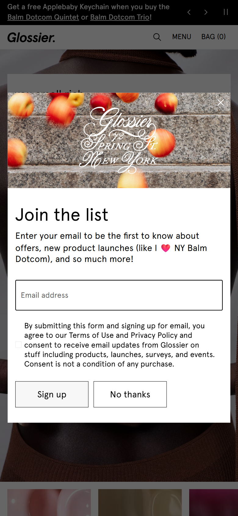 The Glossier site on a phone, showing a product page