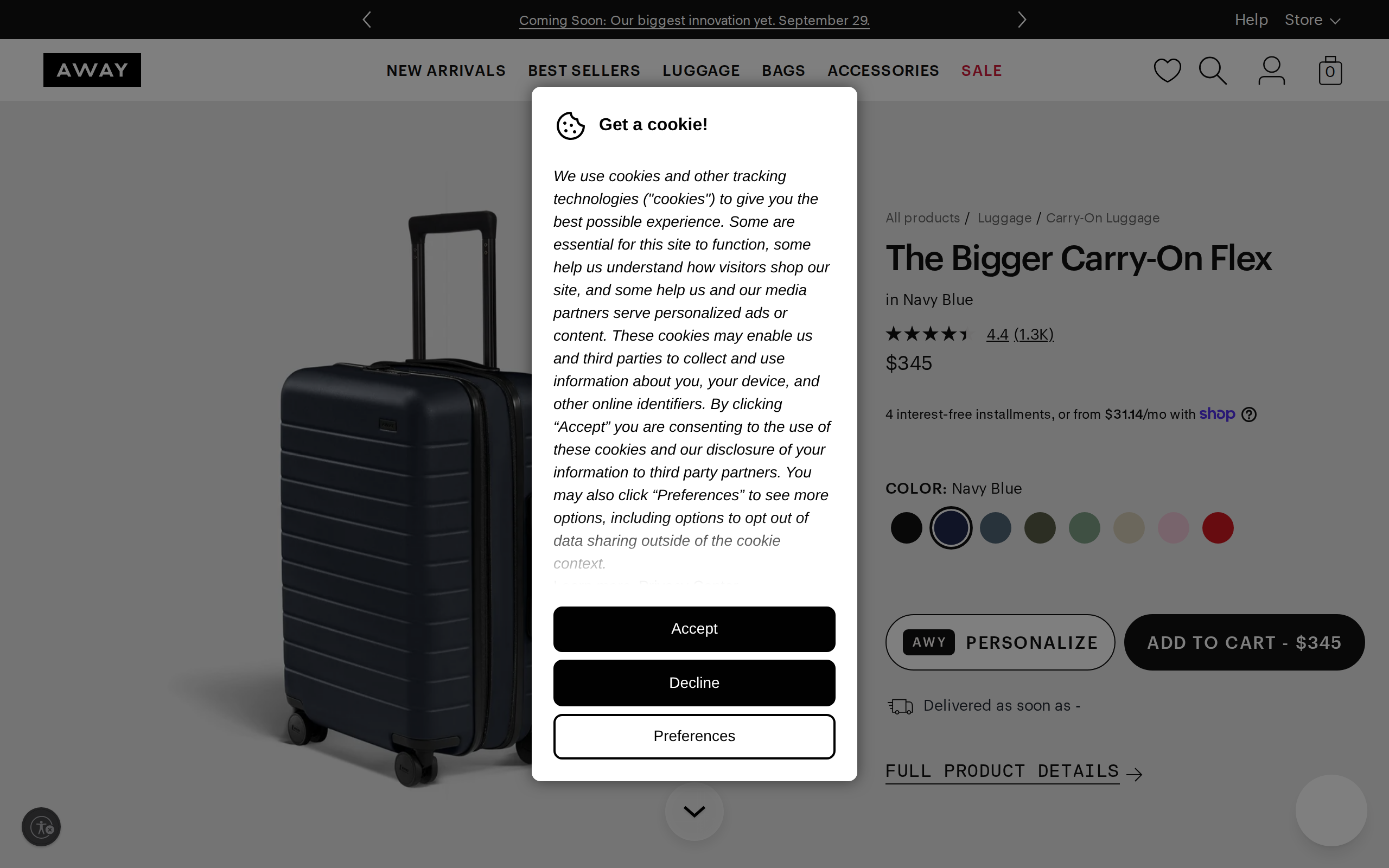 Away Bigger Carry-On Flex product page in Navy Blue priced at $345