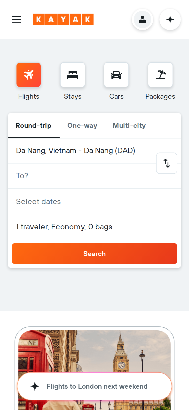 Kayak's mobile flight search screen, showing Flights, Stays, Cars and Packages tabs above a round-trip search form and a "Flights to London next weekend" suggestion
