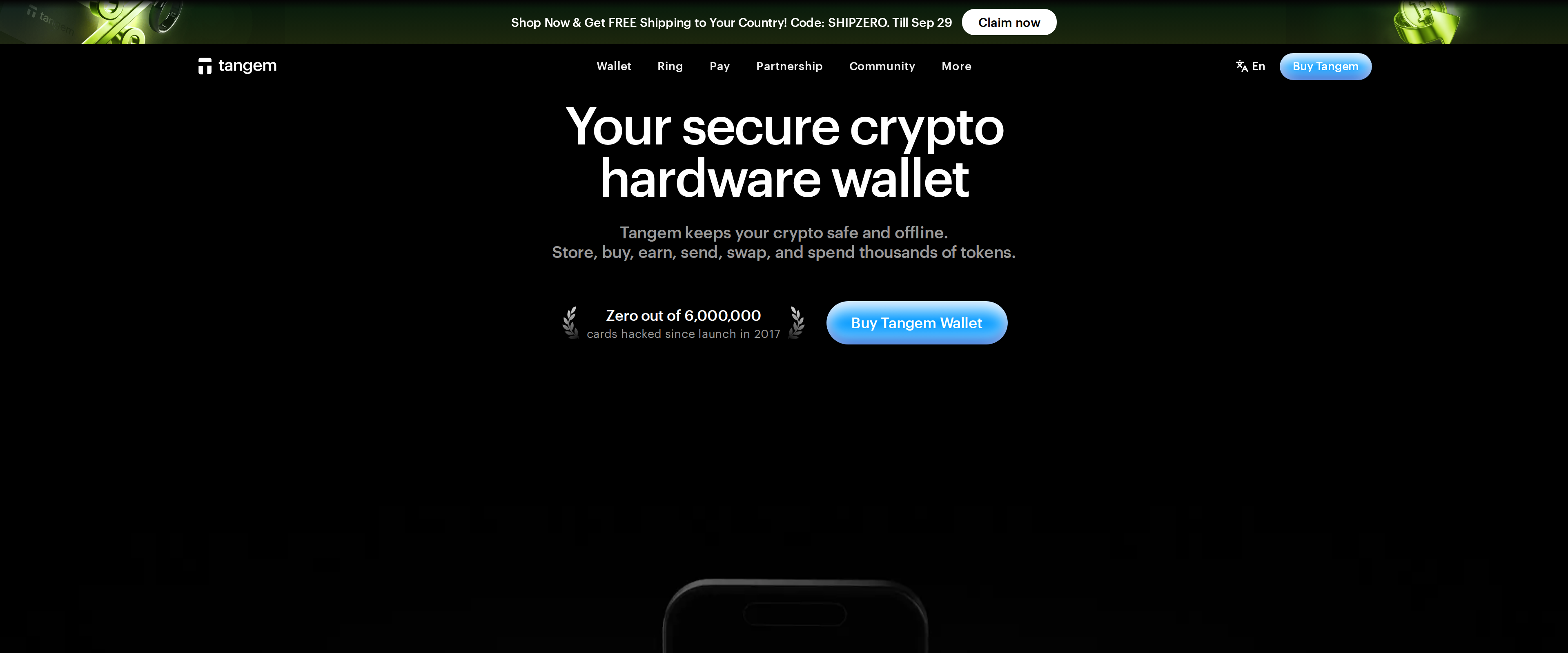 Tangem homepage reading Your secure crypto hardware wallet, with a looping video of a card being tapped against a phone