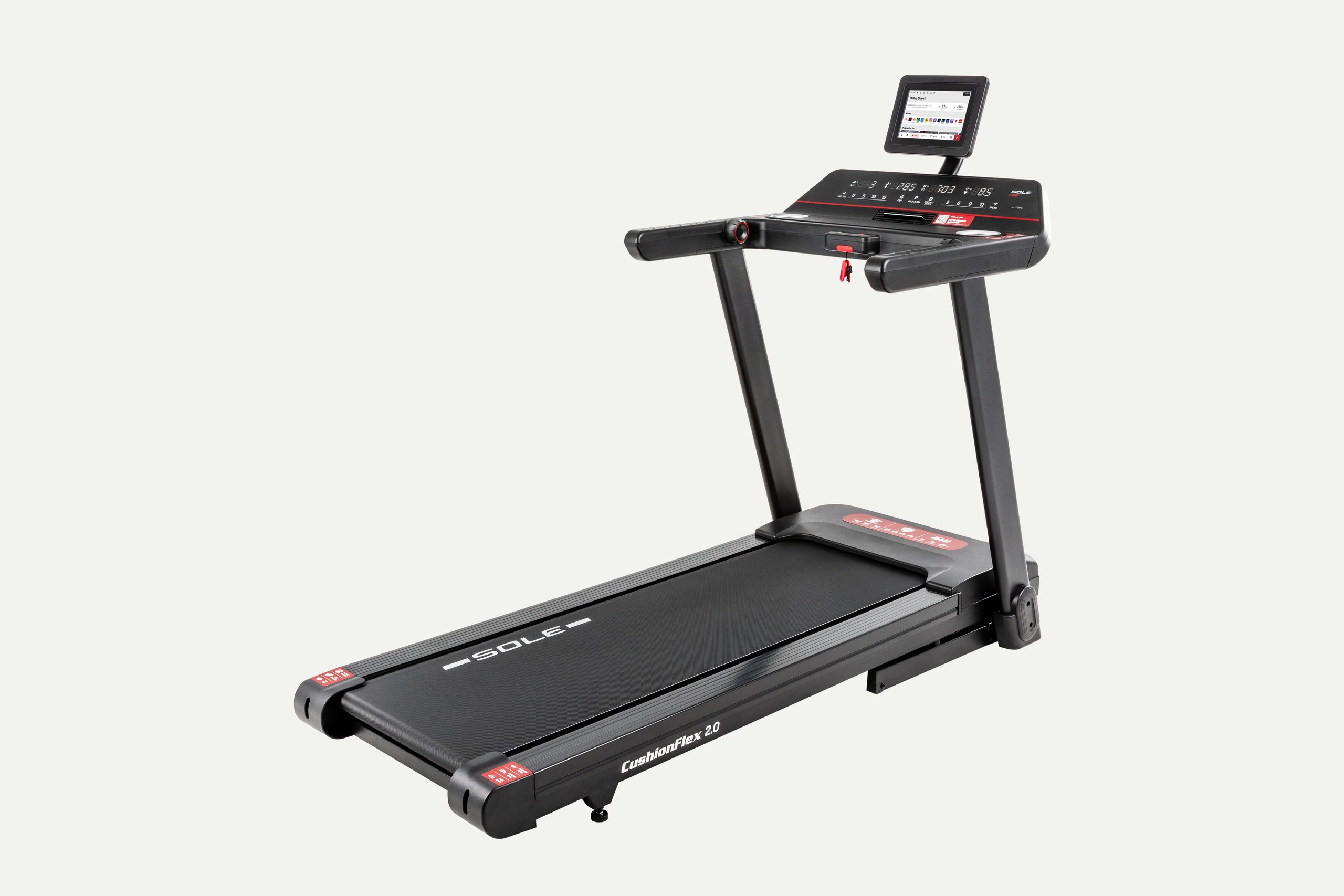 The SOLE F80 treadmill seen from the front left, with a small screen on the console and two upright handrails